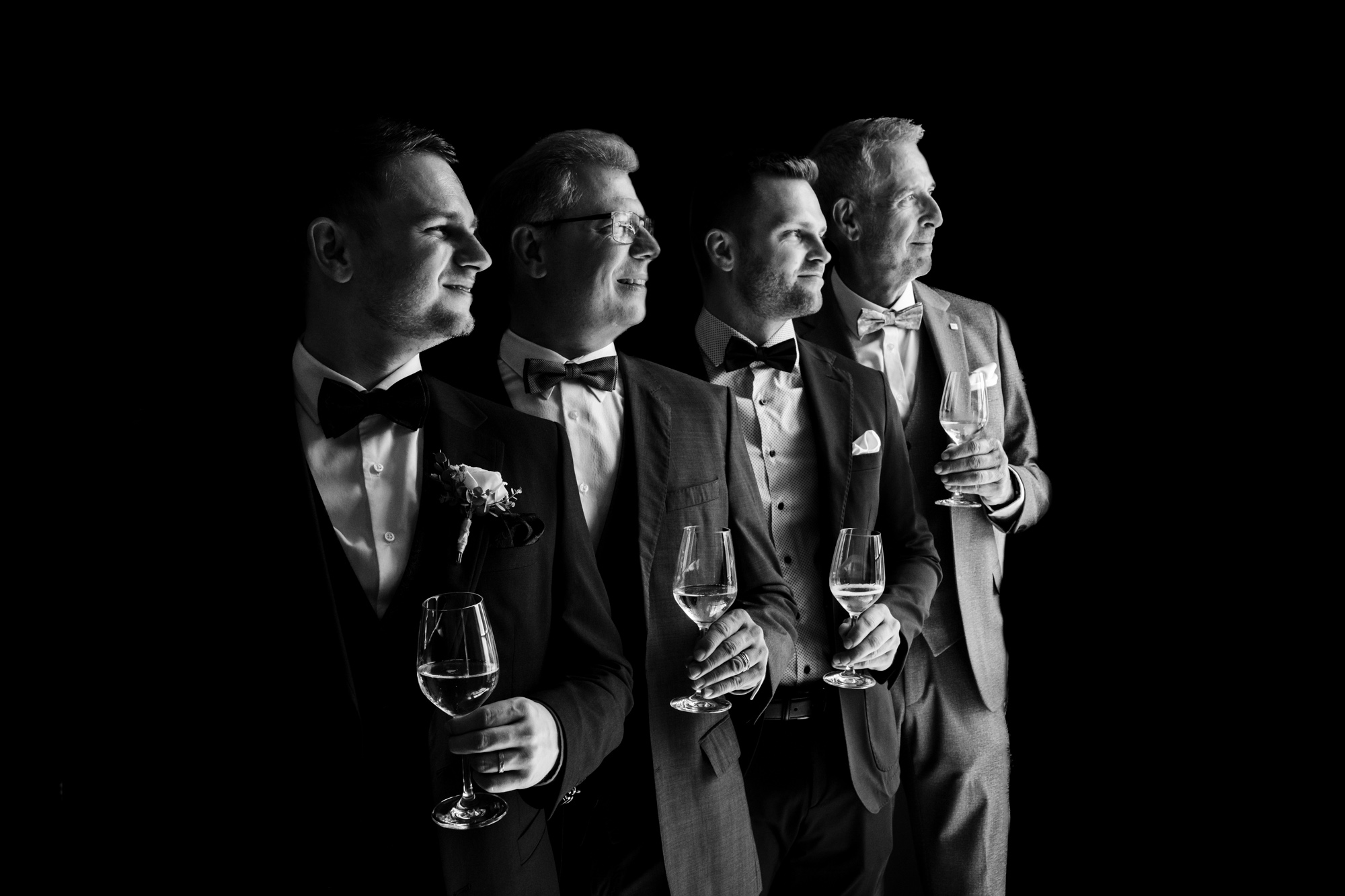 Groomsmen in a line, photo by Hochzeitsfotograf Mischa Bättig