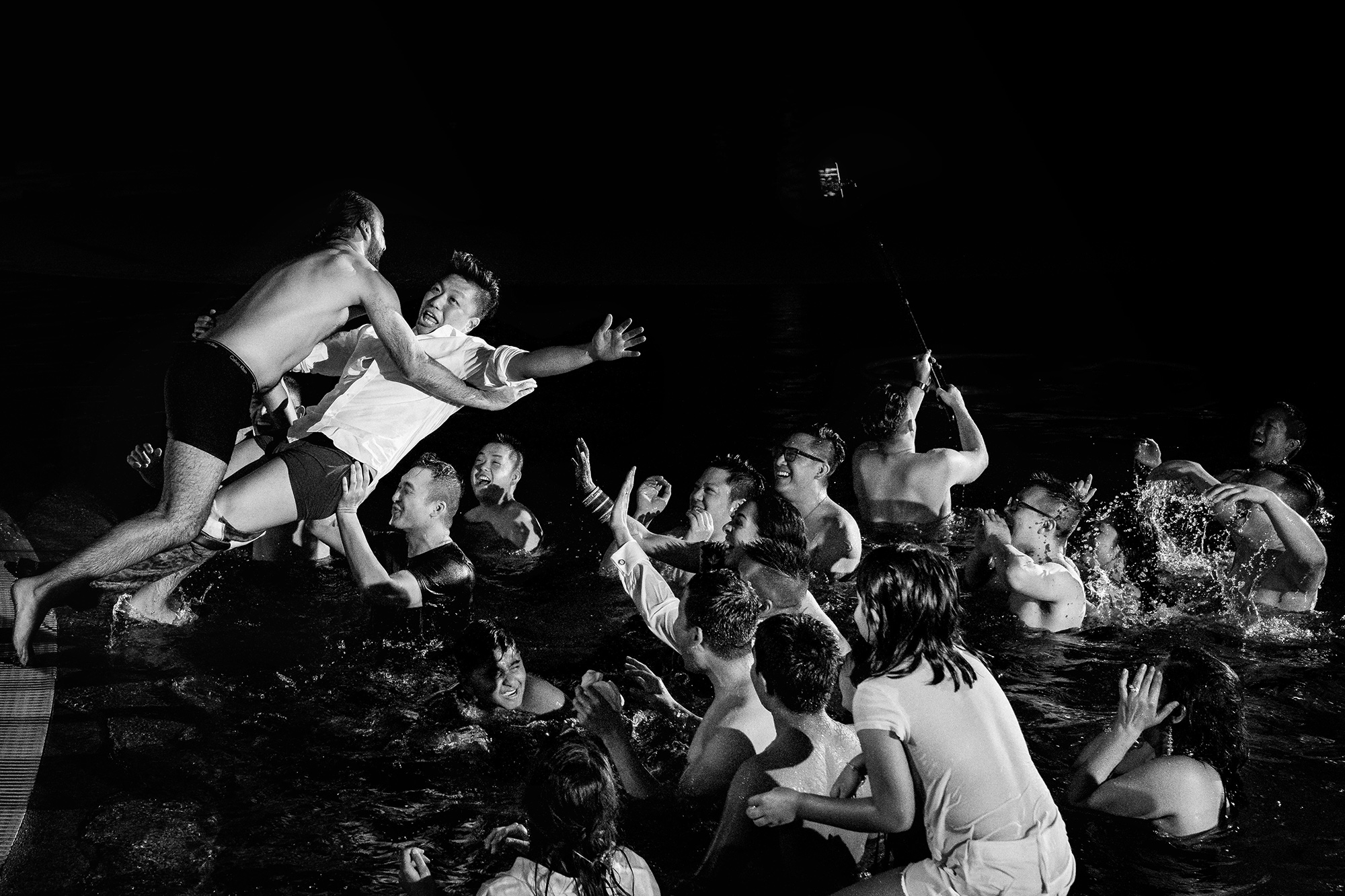 Guests falling into pool - photo by Matei Horvath Photography