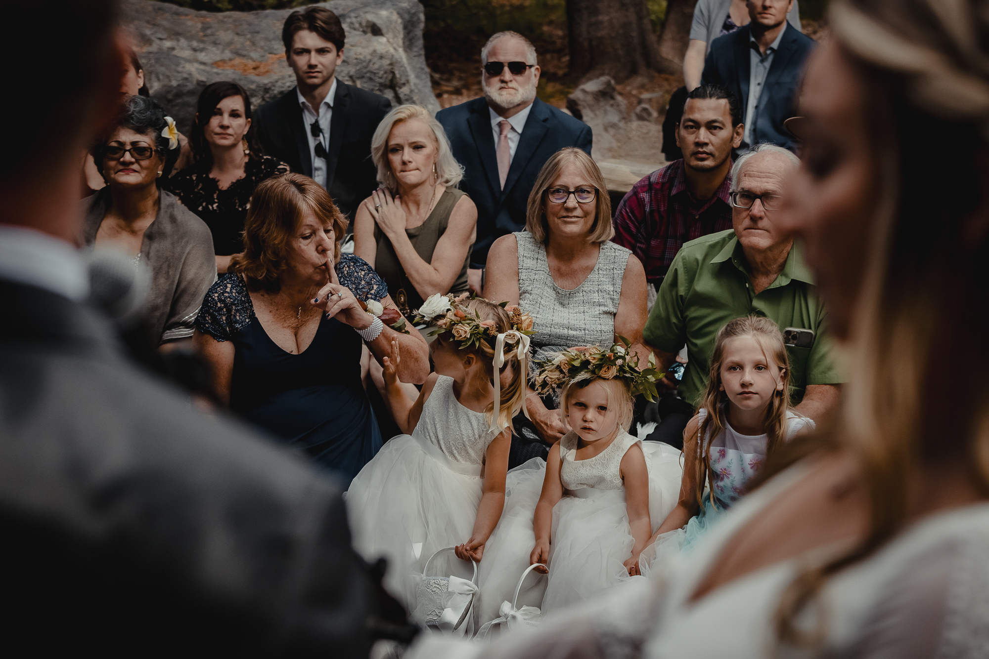 Mom shushing flower girls - photo by Minaret Photo 