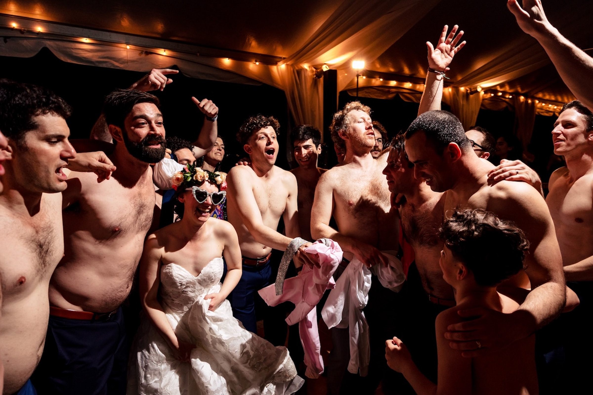 Topless men partying with bride and groom- photo by Natasha Lamalle Photography