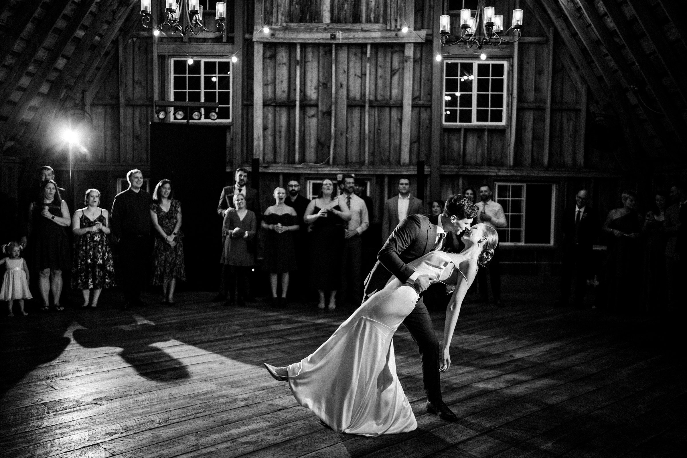 Dip and kiss at the reception, photo by Bradley Hanson Photography, Minneapolis wedding photographers