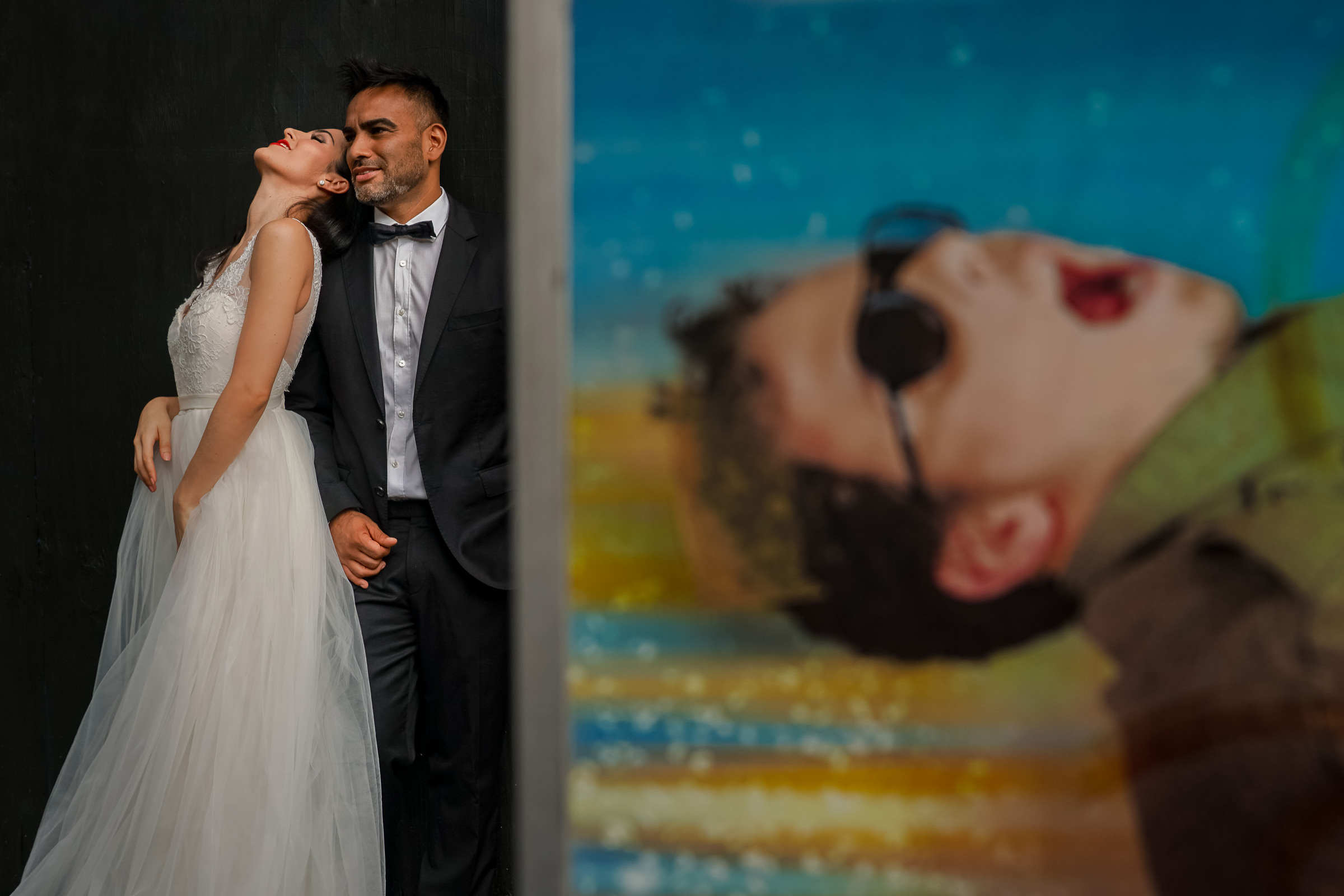 Split frame couple and art - photo by Car & Mel Photography