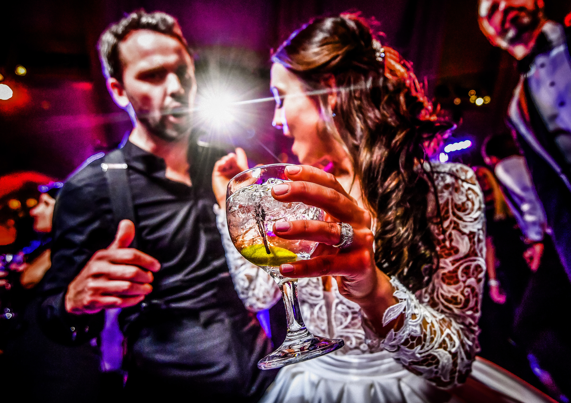 Award winning dance floor photo of bride with cocktail  by Jeff Tisman Photography, New York
