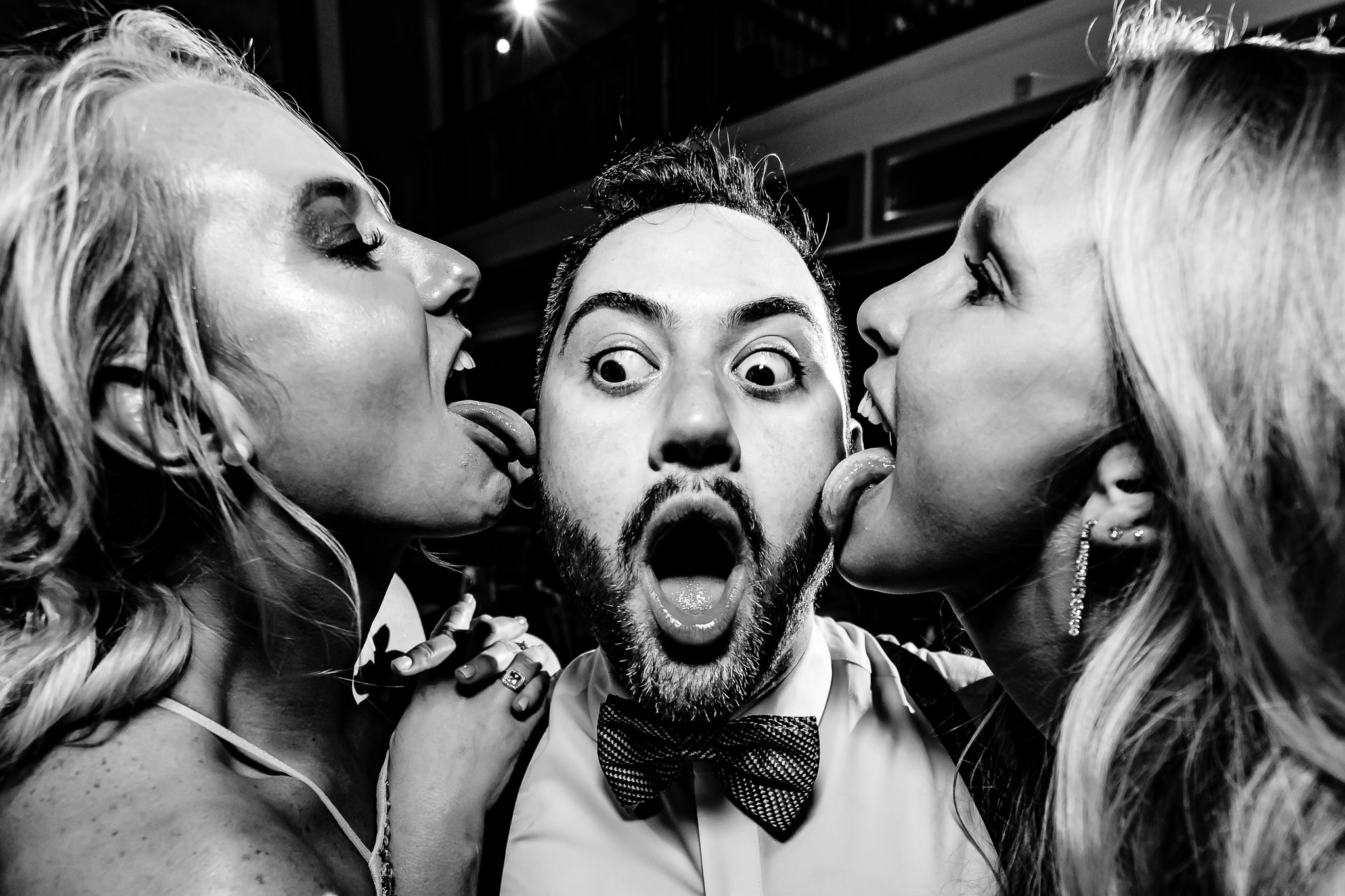 Award winner, groom wowed by two women licking his face - photo by SMJ Photography