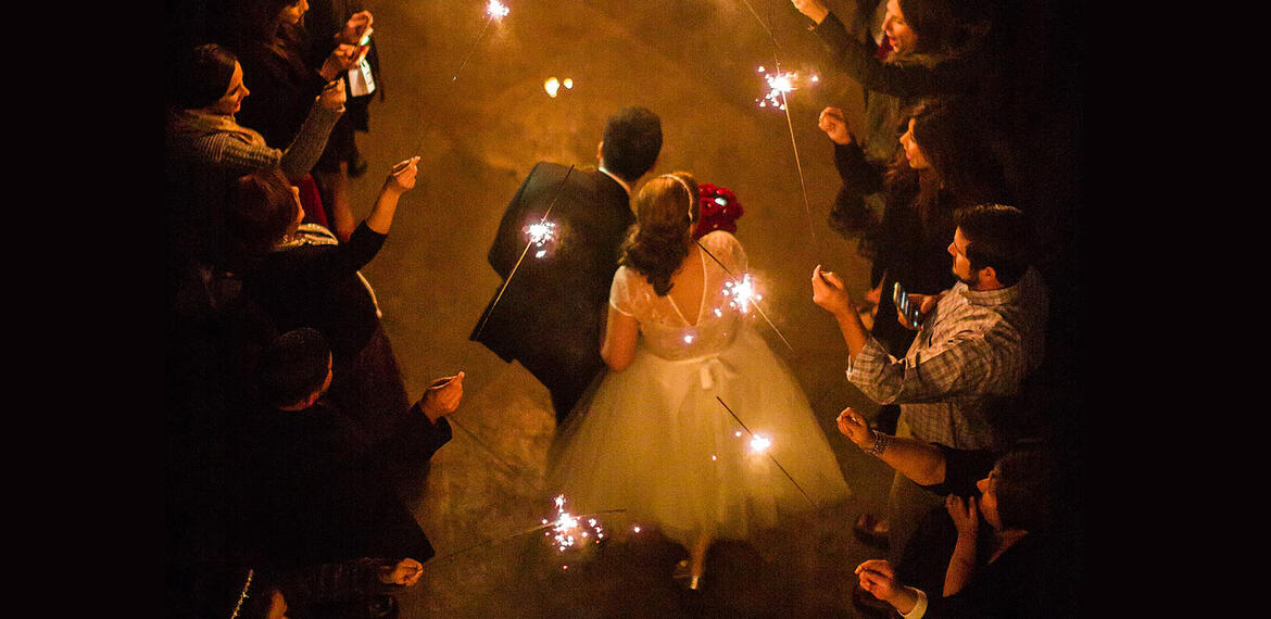 aerial-view-of-couple-exit-through-sparklers-philip-thomas-photography