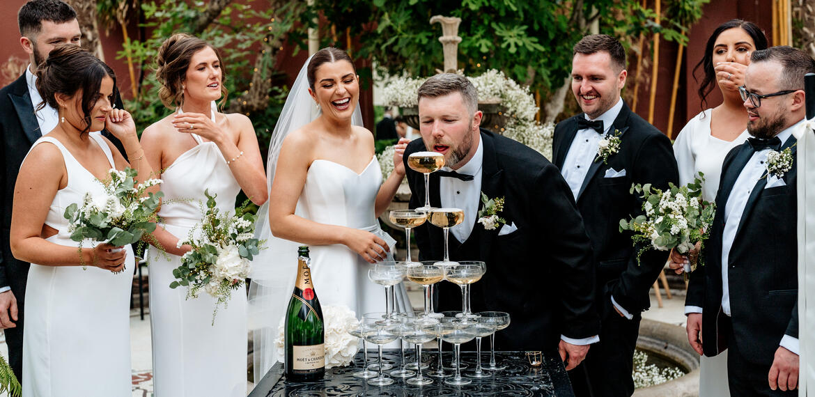 Champagne pop at Kilshane House wedding photographed by Sarah Kate Murphy