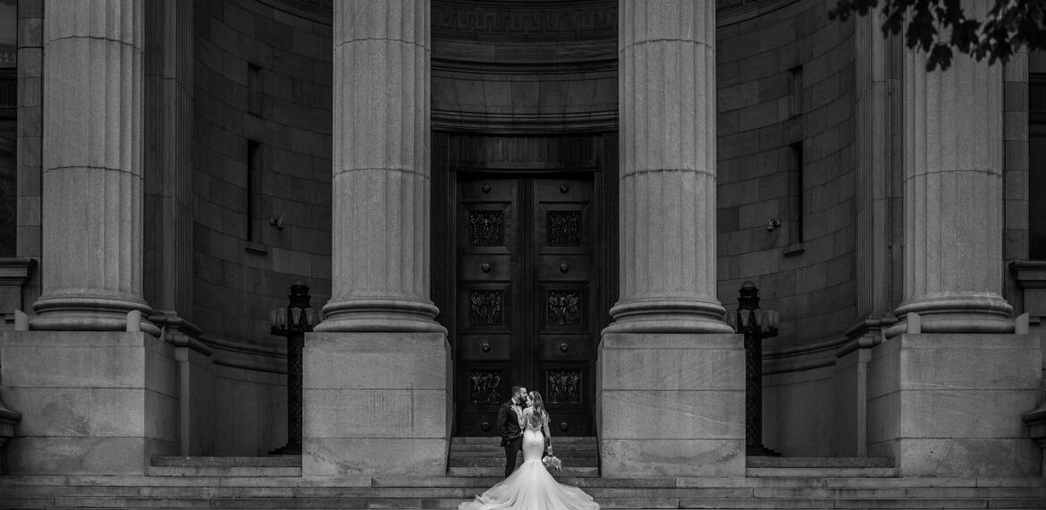 Bride and groom portrait on historic quebec stairs-Madi Photography