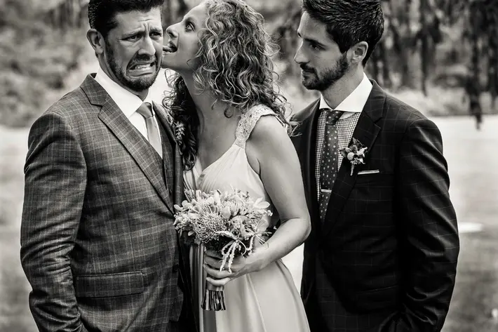 Bride surprises guest with wet willy - photo by JAG Studios