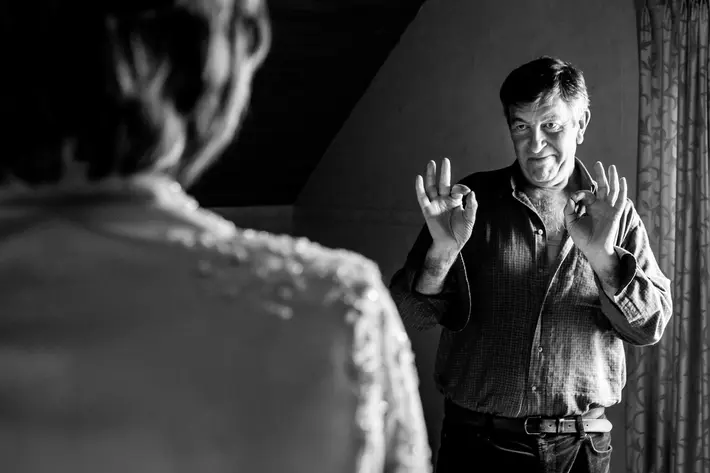Groom shows bride his love with perfect gesture - photo by Philippe Swiggers