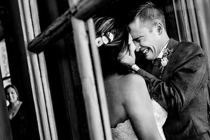 Emotional groom crying with bride at timberline lodge - photo by JOS Studios