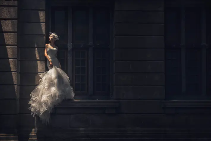 bride-portrait-on-window-sill-worlds-best-wedding-photos-cm-leung-china-wedding-photographers