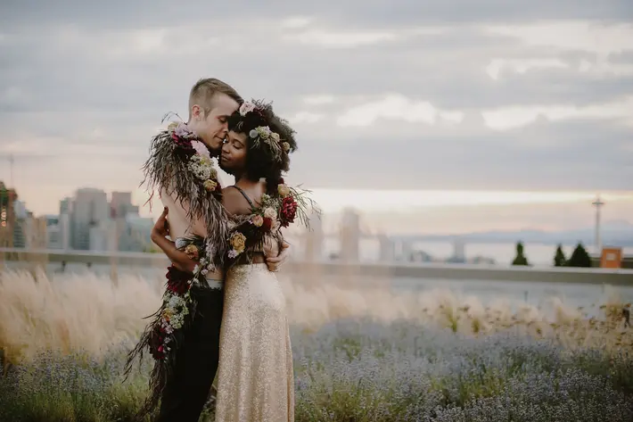 couple-wrapped-in-long-rustic-floral-garland-mixed-race-pnw-kristen-marie-parker