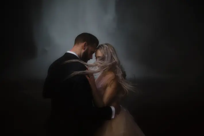 ethereal-portrait-of-couple-at-waterfall-worlds-best-wedding-photos-gabe-mcclintock-calgary