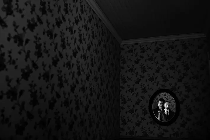 Low light portriat of couple reflected in mirror by Photo JJ - Seattle