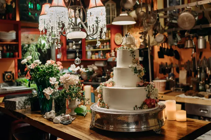 colorful_wedding_cake_in_kitchen_by_sasha_reiko