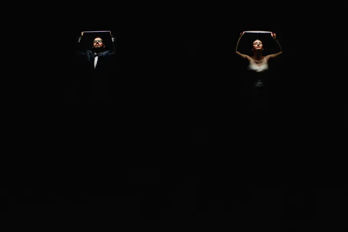 Featured bride-and-groom-holding-lights-over-faces-low-key-portrait-worlds-best-wedding-photos-fer-juaristi-mexico-wedding-photographers