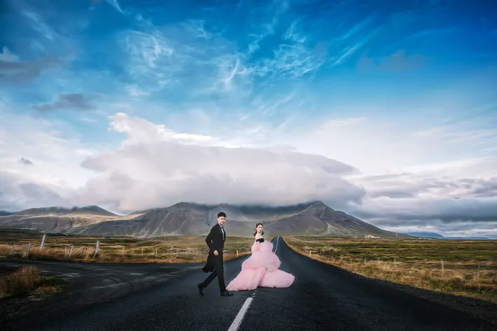 Bride in pink tulle gown and groom in black morning suit - photo by Edwin Tan - Malaysia