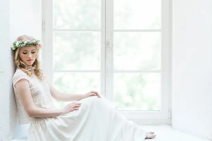 Bride wearing floral crown of pink roses and grape hyacinth - photographed by Jurgita Lukos - Luthuania
