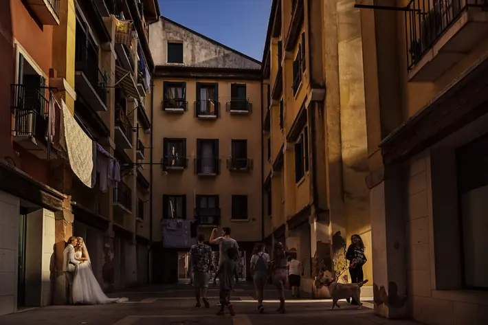 couple portrait on italian street at sunset - Studio Damon Photography