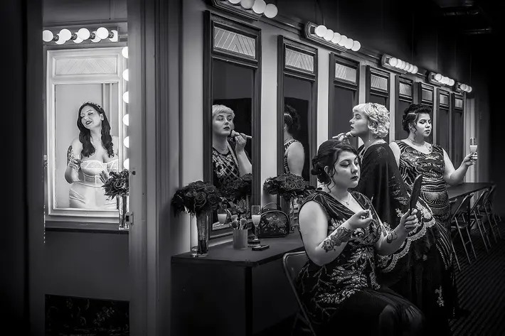 Black and white timeless photo of bridal party getting ready in mirror - Amber Henry - Michigan