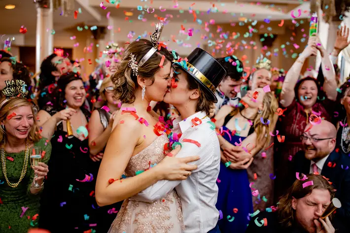 two-brides-kiss-under-confetti-new-years-eve-wedding-bee-two-sweet