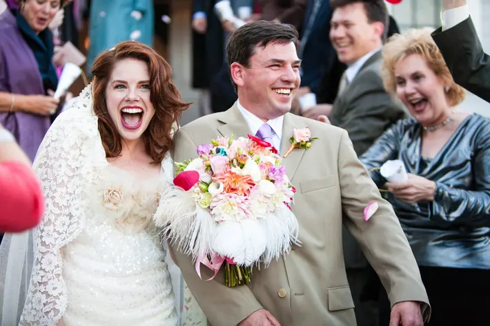 featured-estatic-red-haired-bride-feather-bouquet-lace-dress-groom-in-taupe-suit-worlds-best-wedding-photos-san-juan-island-photographers-la-vie-photo