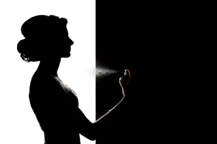 bride-silhouette-spraying-perfume-eye-jogia-photography