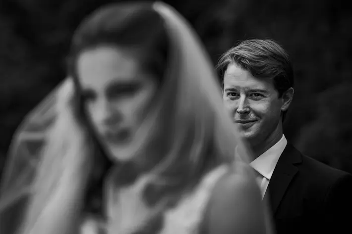 groom-gazing-at-bride-from-behind-viridian-images-photography