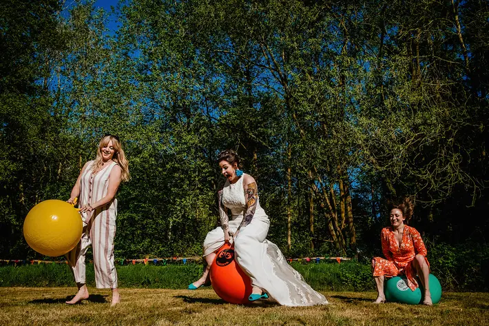 hilarious-shot-of-bride-and-friends-on-bouncy-balls-emma-rich