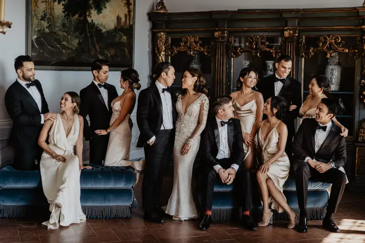Bridal party wearing elegant ivory wedding bridal gowns and classic tuxedos photography by David Bastianoni - Italy