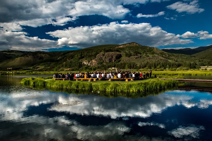 ceremony-setting-at-camp-hale-with-sky-reflection-in-lake-photo-by-j-la-plante-photo