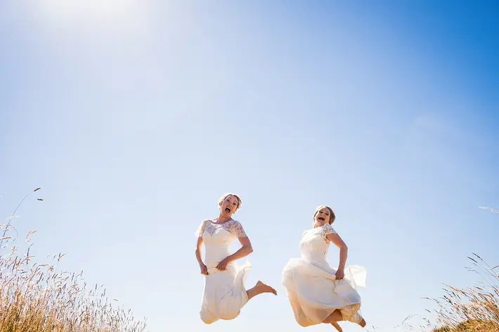 two-barefoot-brides-jumping-emma-rich