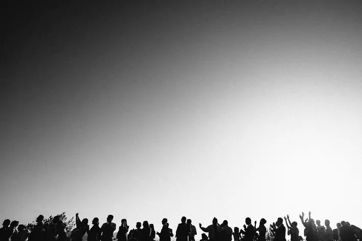 silhouette-group-shot-against-big-sky-bradley-hanson-photography