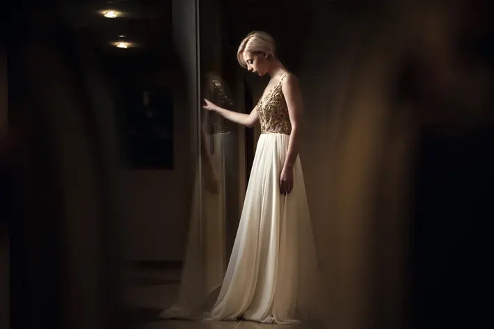 Portrait of bride hair wearing cream chiffon skirt and gold lace bodice by El Marco Rojo Photography - Spain