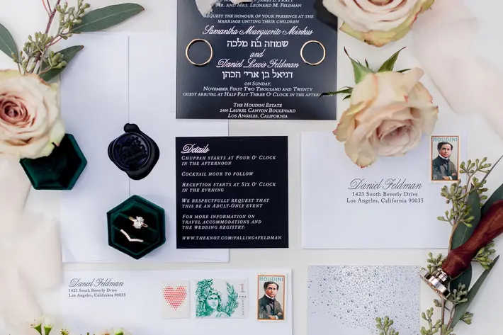 Elegant black and white wedding invitation flatlay photographed by M. Hart Photography - Los Angeles