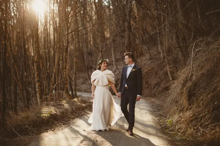 couple-walking-down-wooded-road-ed-peers-photography