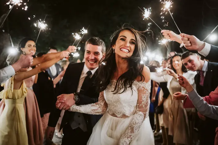 couple-exit-under-sparklers-lima-conlon-photography