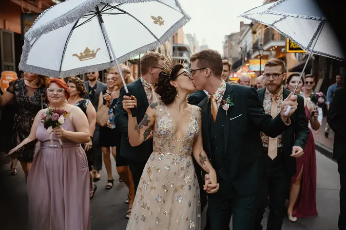 bride-and-groom-wedding-parade-in-new-orleans-new-orleans-austin-houston-wedding-photographer-photo-by-dark-roux