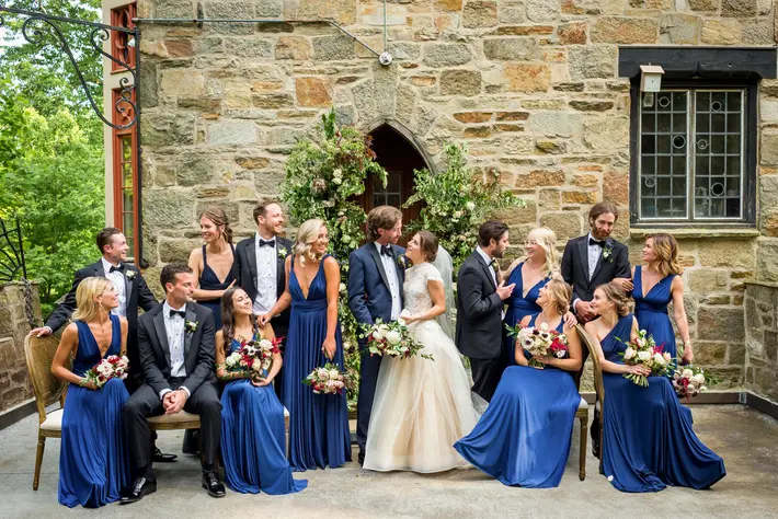 formal-group-shot-with-blue-gowns-cloister-castle-baltimore-photo-by-procopio-photography