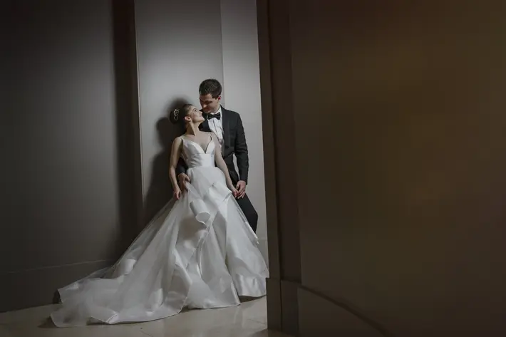 fashionable-couple-portrait-silk-ruffled-wedding-dress-elmarcorojo-best-photographers-spain