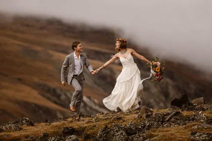 adventure-couple-running-on-mountain-photo-by-adventure-instead