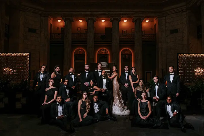wedding-party-group-shot-in-low-light-charmi-pena