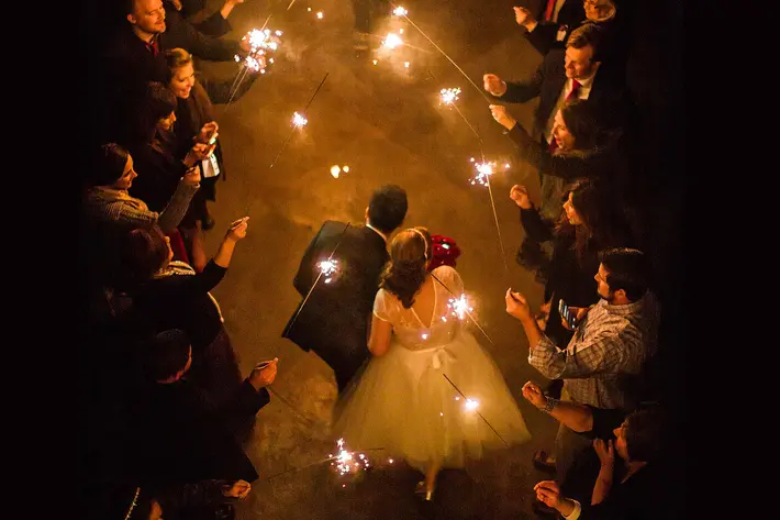 aerial-view-of-couple-exit-through-sparklers-philip-thomas-photography