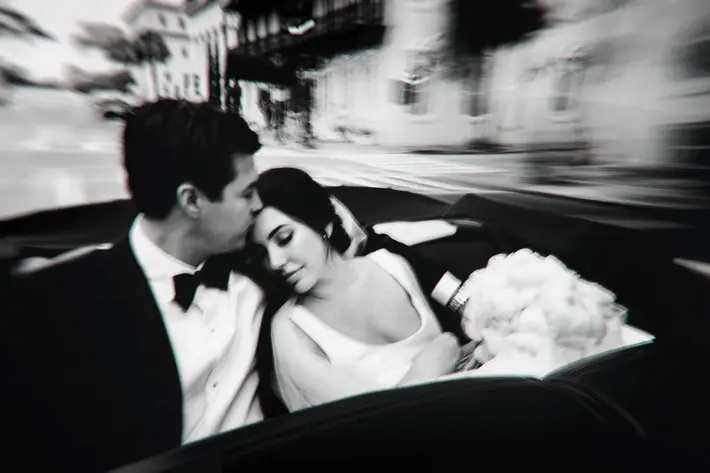 couple-in-exit-car-with-intentional-blur-photo-by-john-joseph