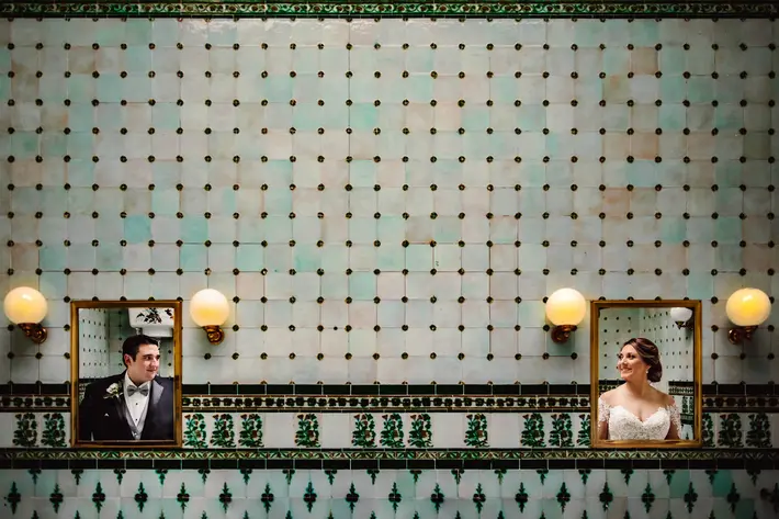 Lima_Conlon_bride-and-groom-reflected-mirrors-on-tiled-wall-lima-conlon-photography