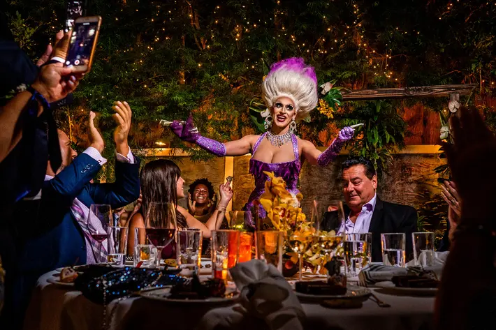 Drag queen at wedding reception, award winning photo by Bee Two Sweet, DC