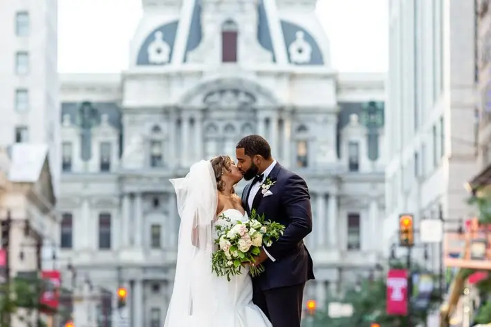Petronella_kiss-on-street-against-cathedral-in-philadelphia-pennsylvania-photo-by-petronella-photography