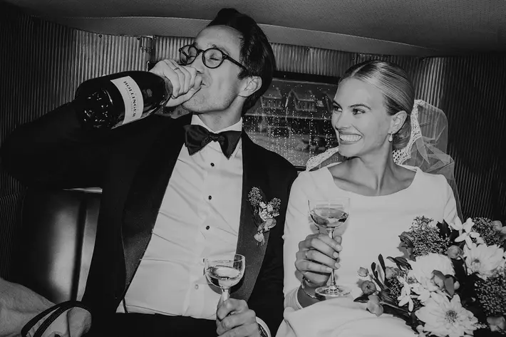 Paparazzi style photo of couple drinking champagne in back of limo, Camilla Andersen, Millifoto, Norway