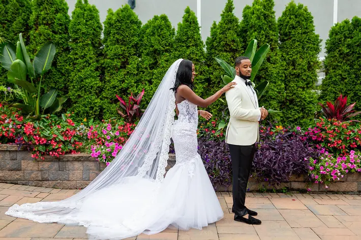 First look photo by Petronell Photography - Michigan wedding photographers