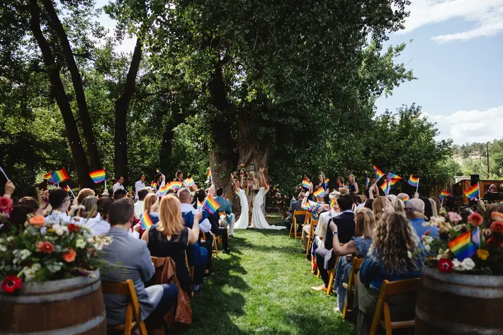 Brides cheer at ceremony Kate Merrill